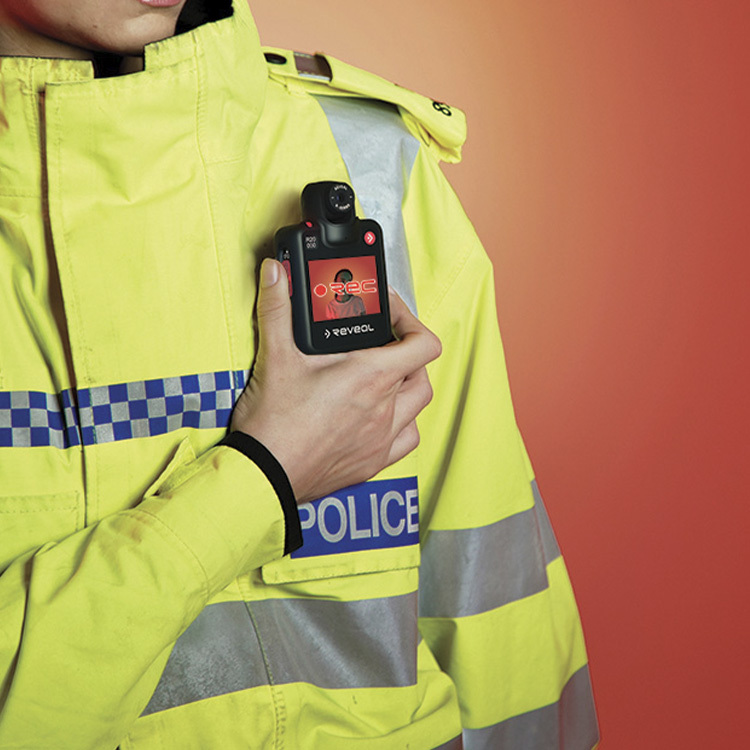 Police holding camera R2 1